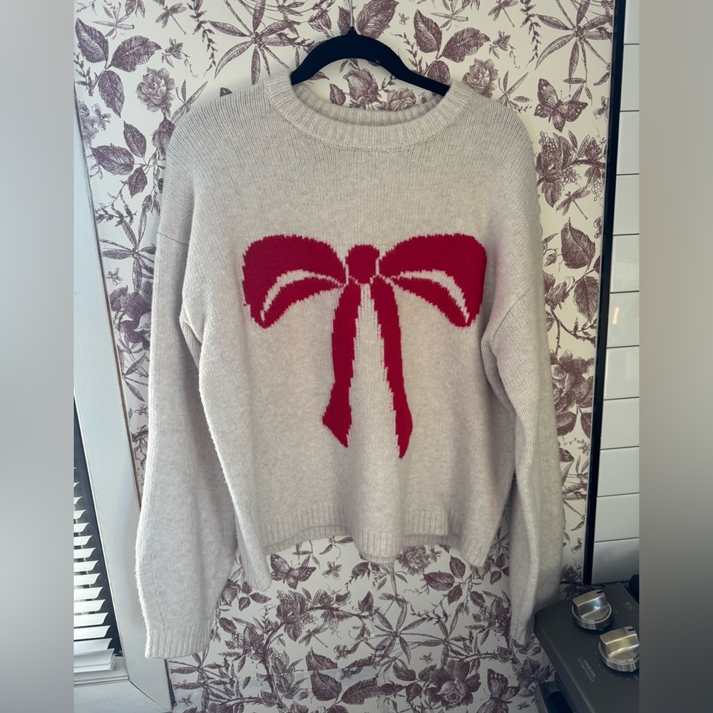 A New day-Cozy Cream Sweater with Red Bow Design